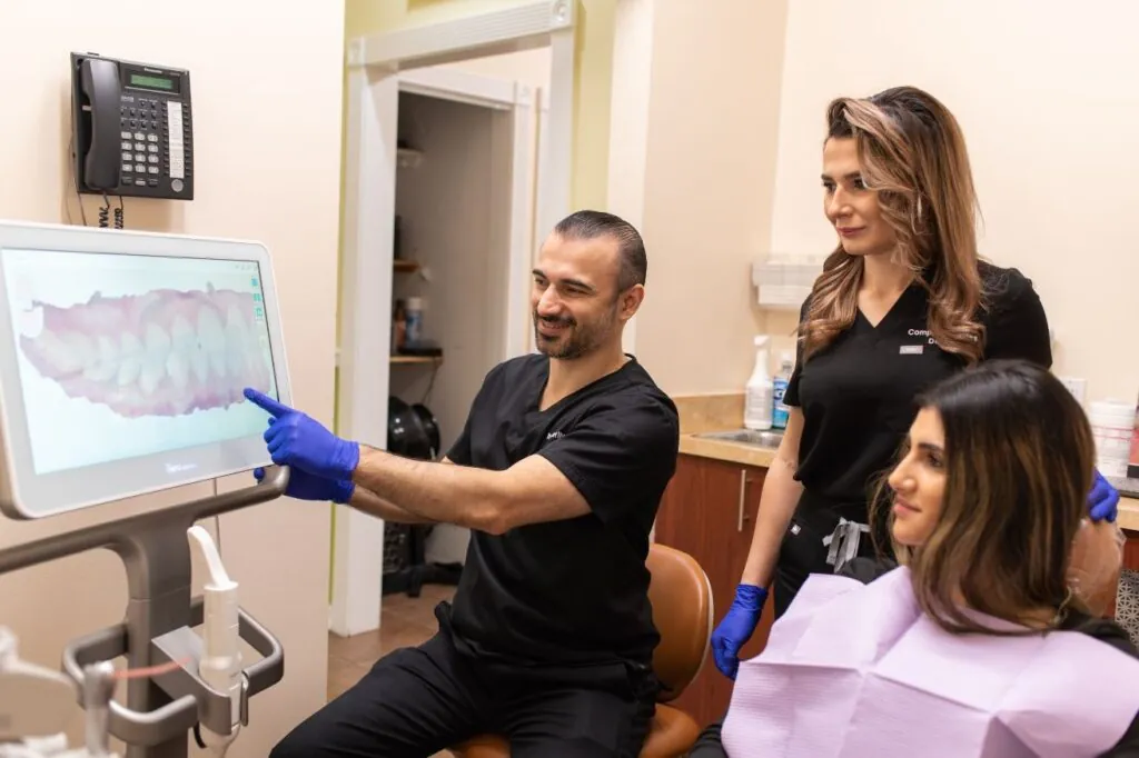 Dentist reviewing a digital scan with a patient