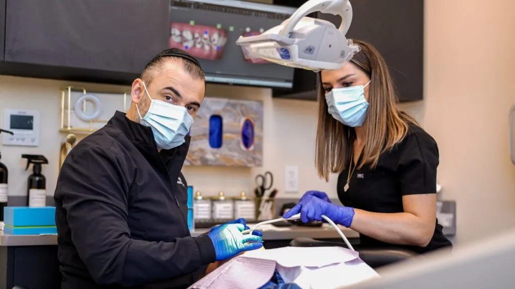 Dentist and assistant during treatment