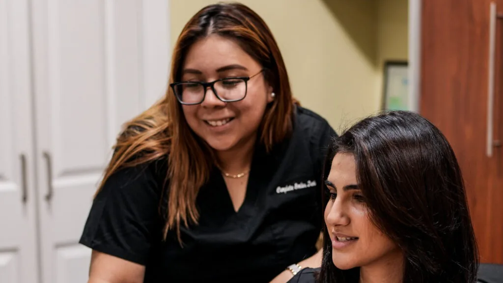 Dental Implants & Cosmetics team members in the office